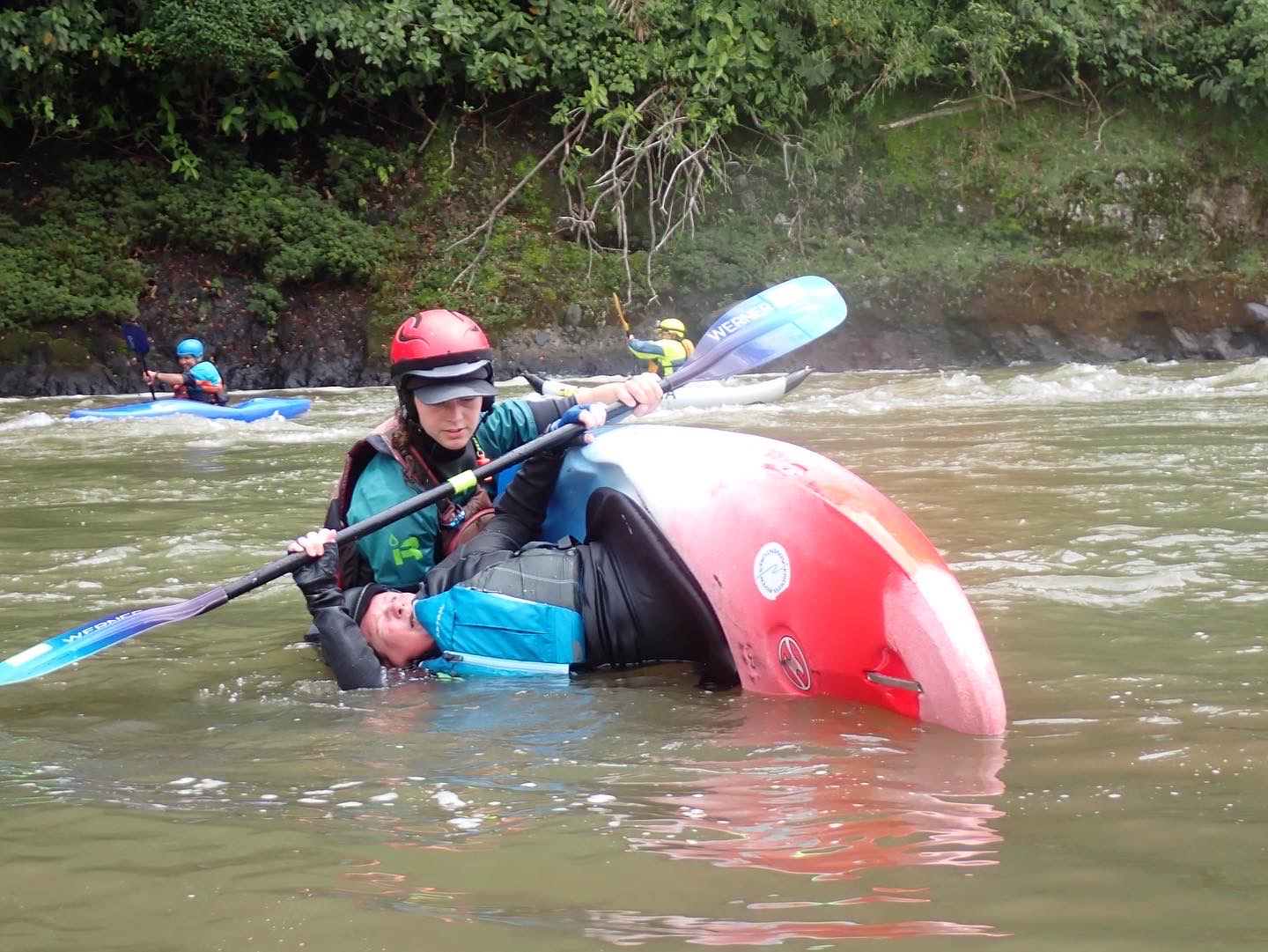 Kayaker learning to roll - Endless River Adventures 