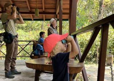 A young bird watcher in Ecuador - Endless River Adventures