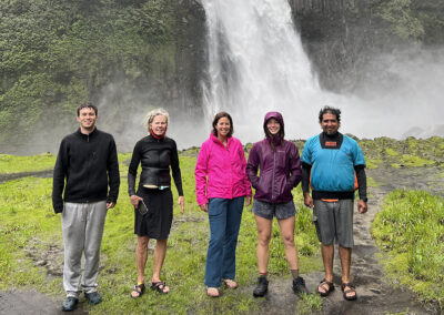 Visitors of Ecuador in front of a waterfall - Endless River Adventures